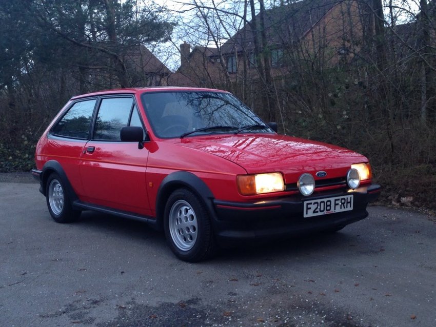A front three-quarter view with the original registration.