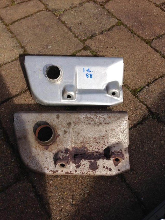 Old and replacement mounting brackets side by side.