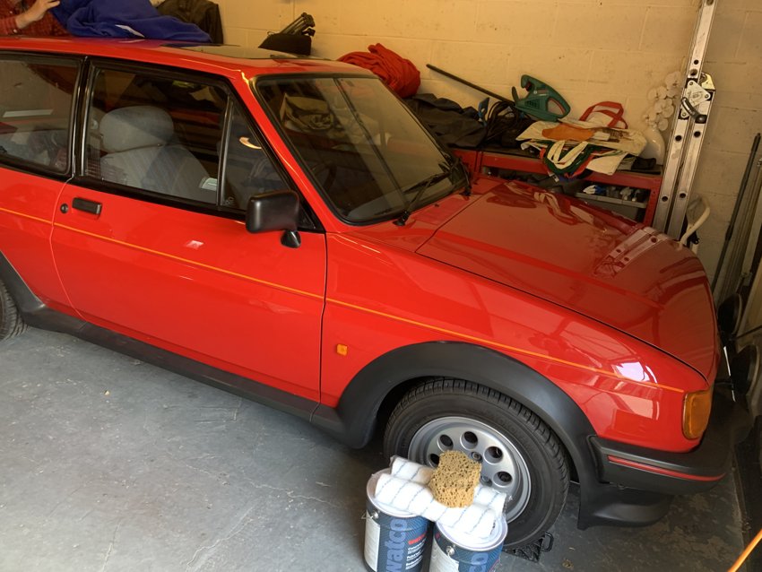 The XR2 during a wheel-cleaning session in the garage.